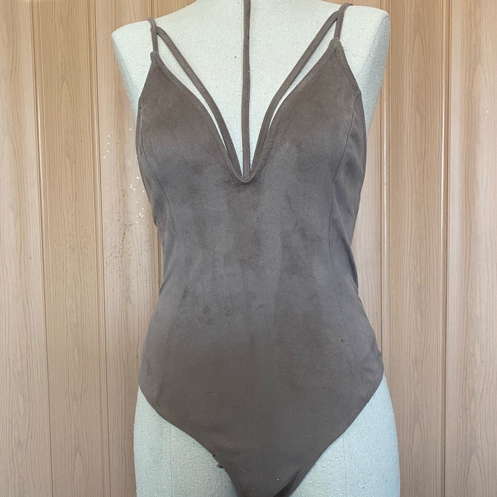 Suede like tan body suit with tie to neck